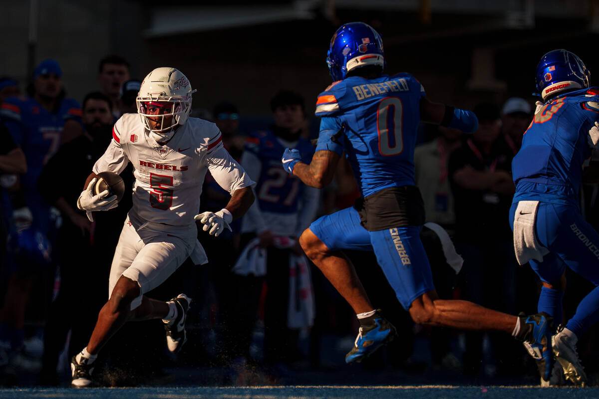 UNLV wide receiver Kay Moore (5) runs with the ball during the game against Boise State on Satu ...