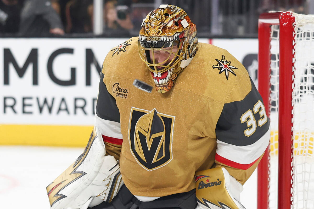 Vegas Golden Knights goaltender Adin Hill (33) makes a save against the Calgary Flames during t ...