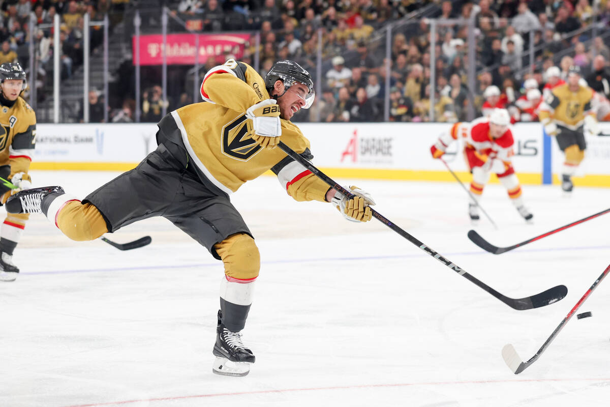 Vegas Golden Knights right wing Reilly Smith (19) shoots against the Calgary Flames during the ...