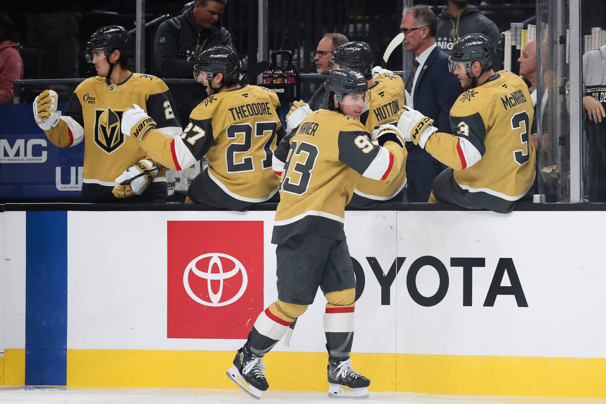 Vegas Golden Knights right wing Mitch Marner (93) celebrates with teammates after scoring again ...