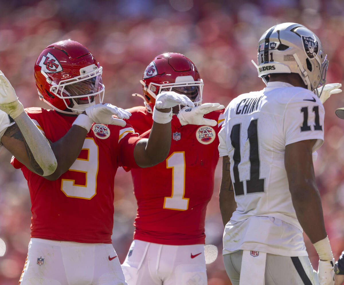 Kansas City Chiefs wide receiver Juju Smith-Schuster (9) and wide receiver Xavier Worthy (1) wa ...