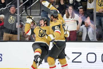 Vegas Golden Knights right wings Mitch Marner (93) and Mark Stone (61) celebrate after Marner&# ...