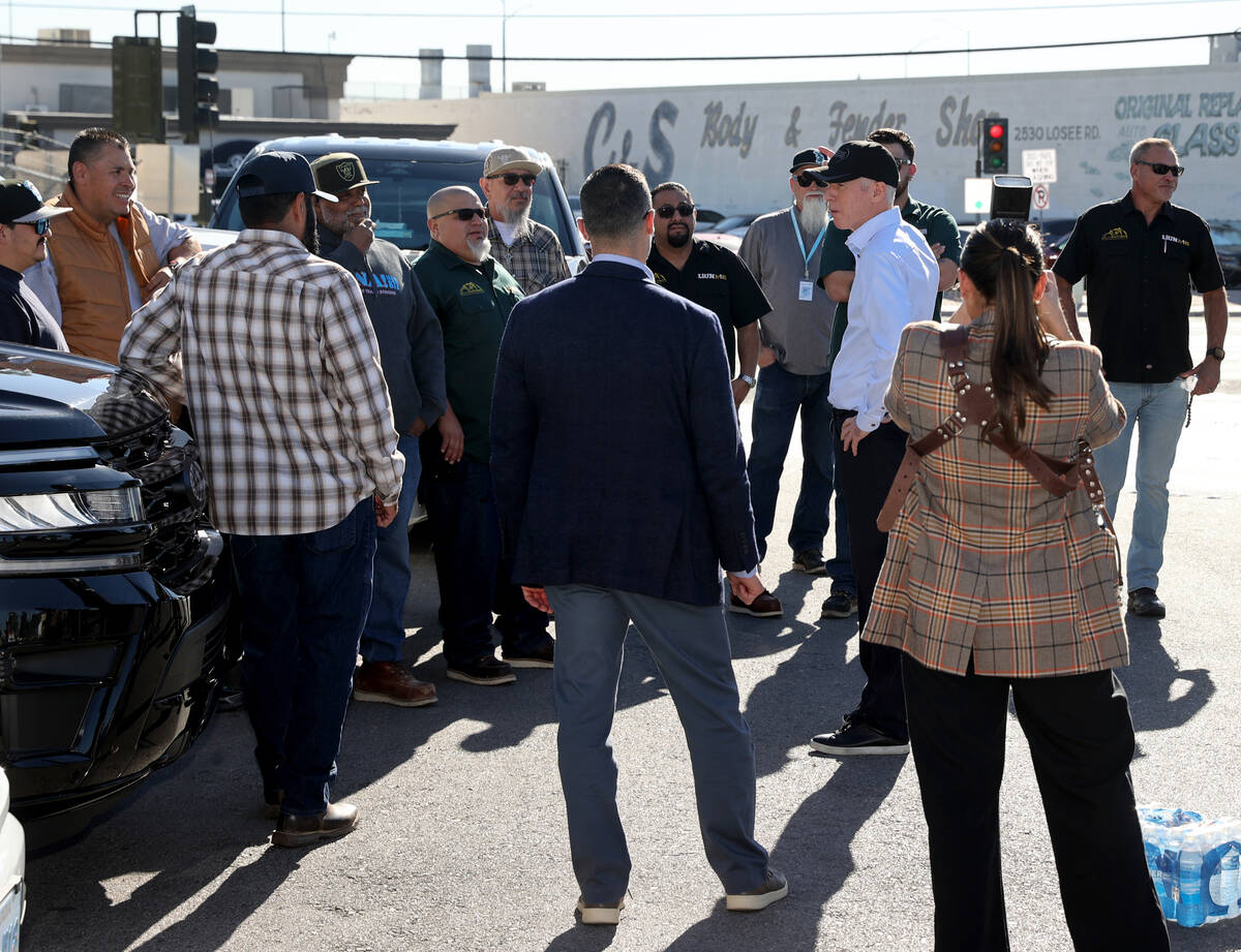 U.S. Secretary of Energy Chris Wright talks to union members from multiple unions before a pres ...