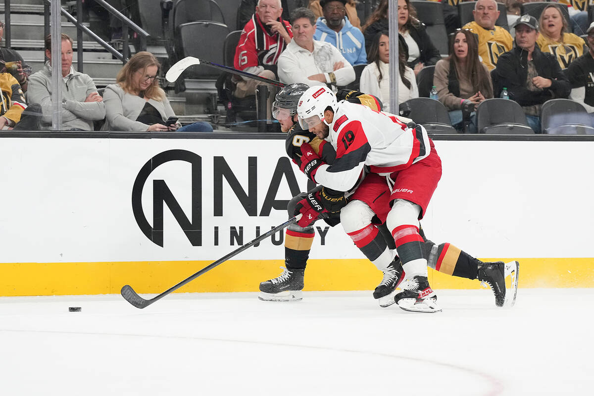 Vegas Golden Knights center Jack Eichel (9) and Carolina Hurricanes defenseman K'Andre Mil ...
