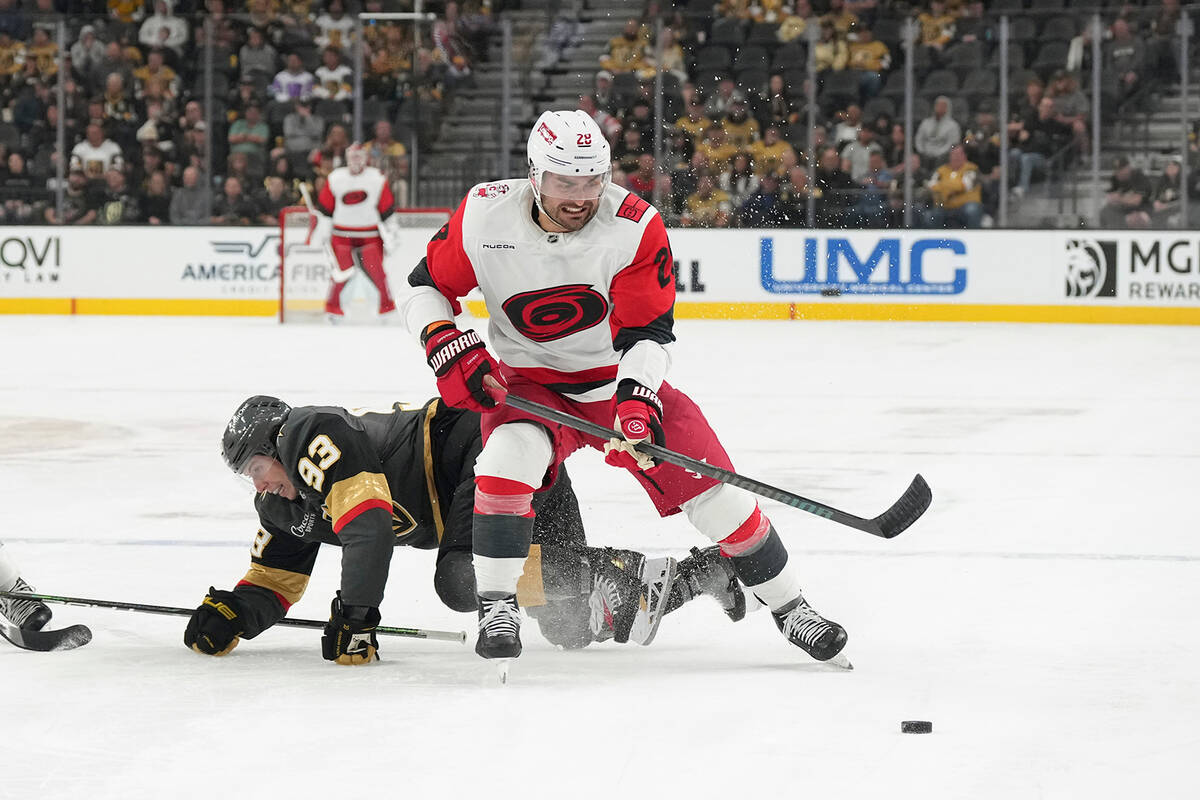 Vegas Golden Knights right wing Mitch Marner (93) collides with Carolina Hurricanes left wing W ...