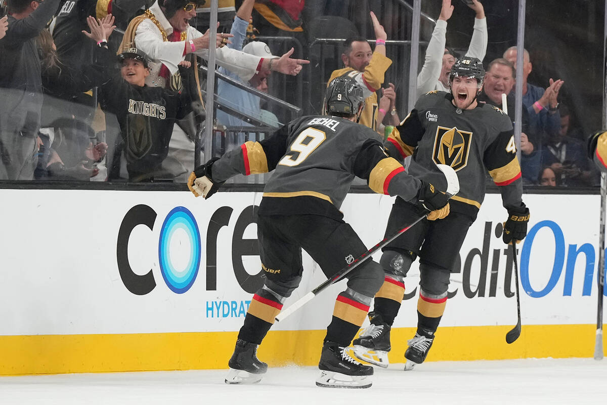 Vegas Golden Knights left wing Ivan Barbashev (49) celebrates his goal with center Jack Eichel ...