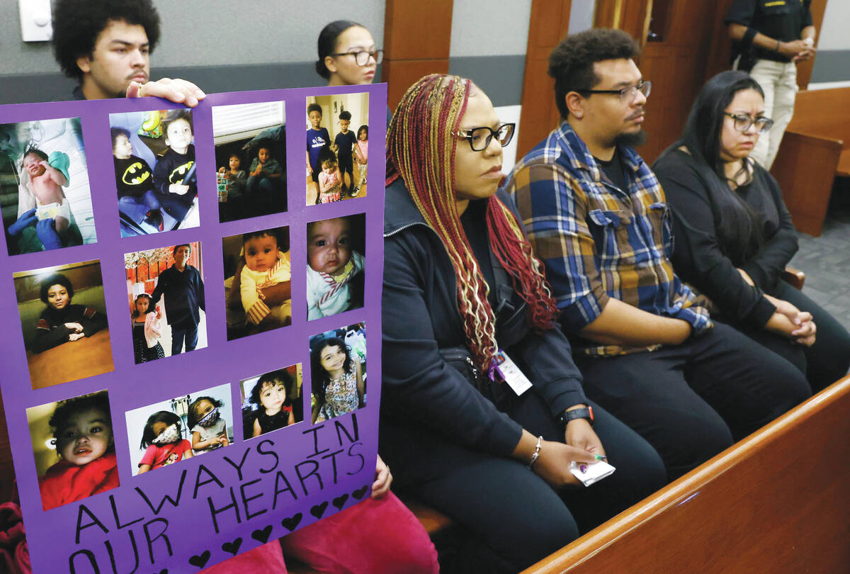 Photographs of crash victims Taliyah Lewis, 6, and Dante Lewis, 11, are displayed as Cynthia Al ...