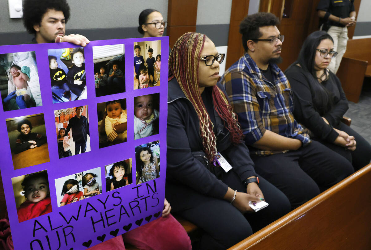 Photographs of crash victims Taliyah Lewis, 6, and Dante Lewis, 11, are displayed as Cynthia Al ...