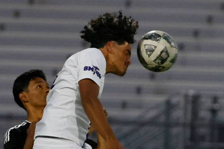 Sunrise Mountain striker Leandro Molina Siam (4) goes for a header against Desert Pines during ...