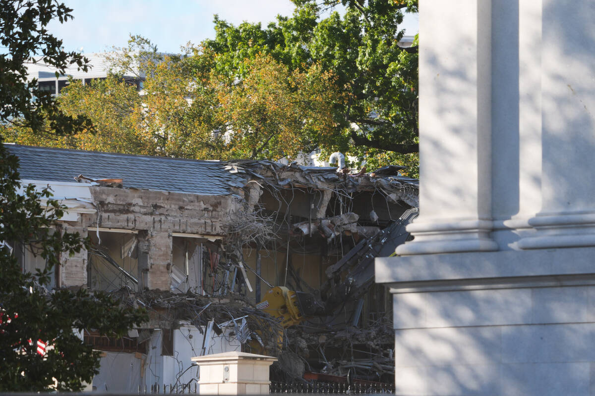 Work begins on the demolition of a part of the East Wing of the White House, Monday, Oct. 20, 2 ...