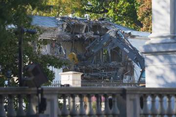 Work begins on the demolition of a part of the East Wing of the White House, Monday, Oct. 20, 2 ...