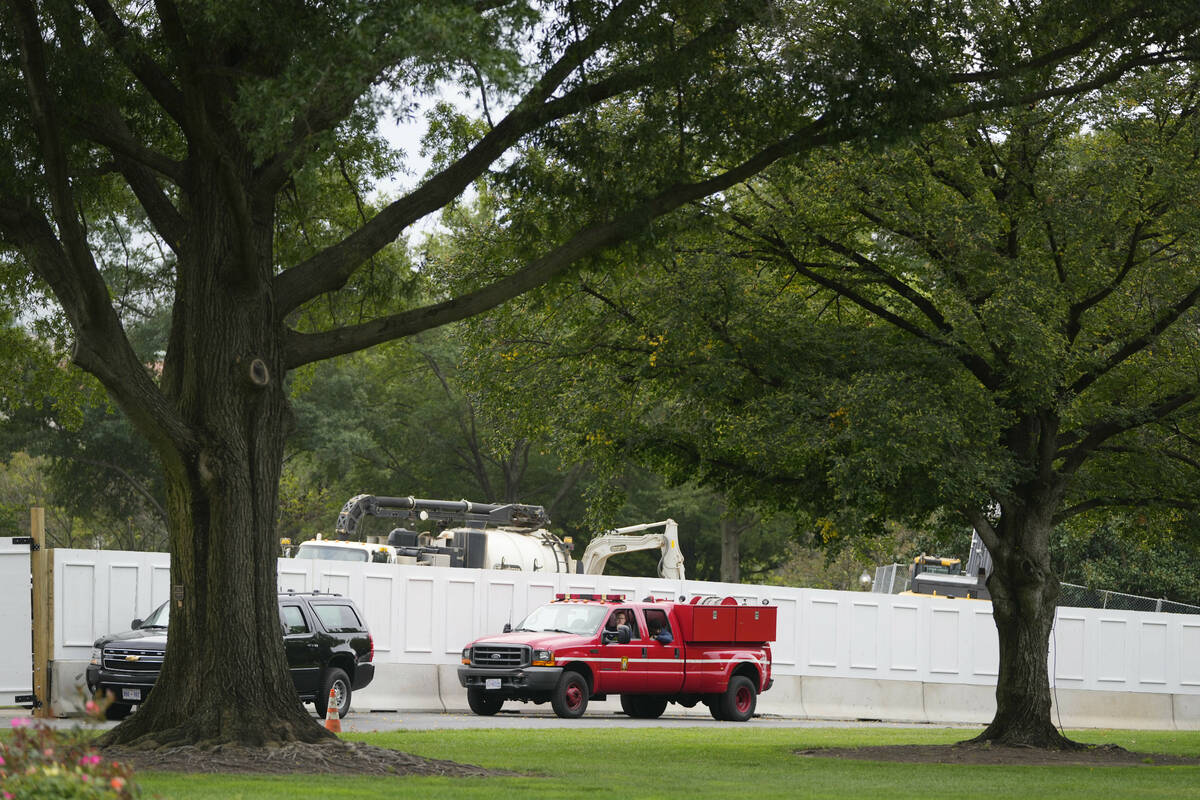 Barricades are in place for construction work for the planned new White House ballroom Sunday, ...