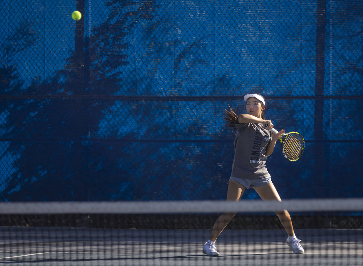 The Meadows’ Somi Song plays against Liberty during the 4A tennis team Southern Region c ...