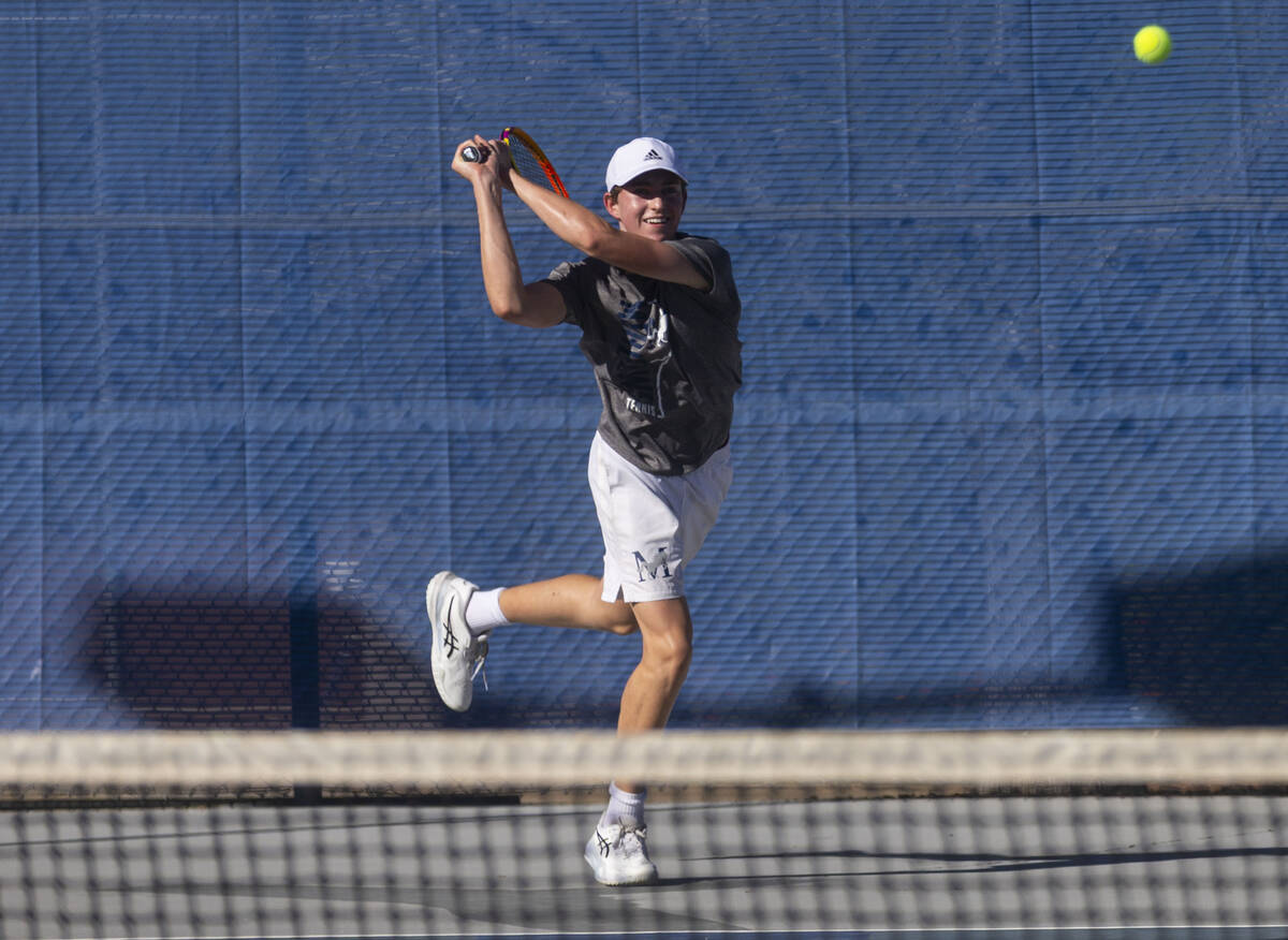 The Meadows’ Alec Kosyagin plays against Liberty during the 4A tennis team Southern Regi ...