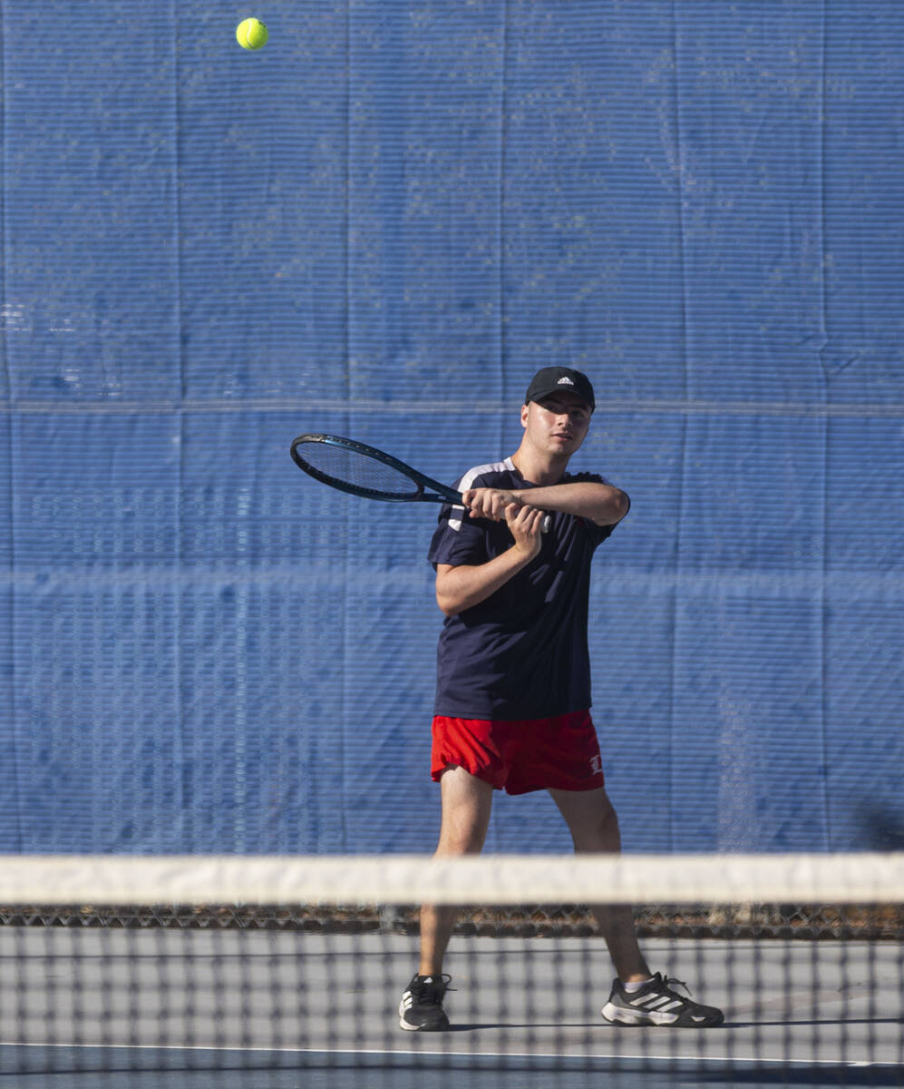 Liberty’s Connor Casey plays against The Meadows during the 4A tennis team Southern Regi ...