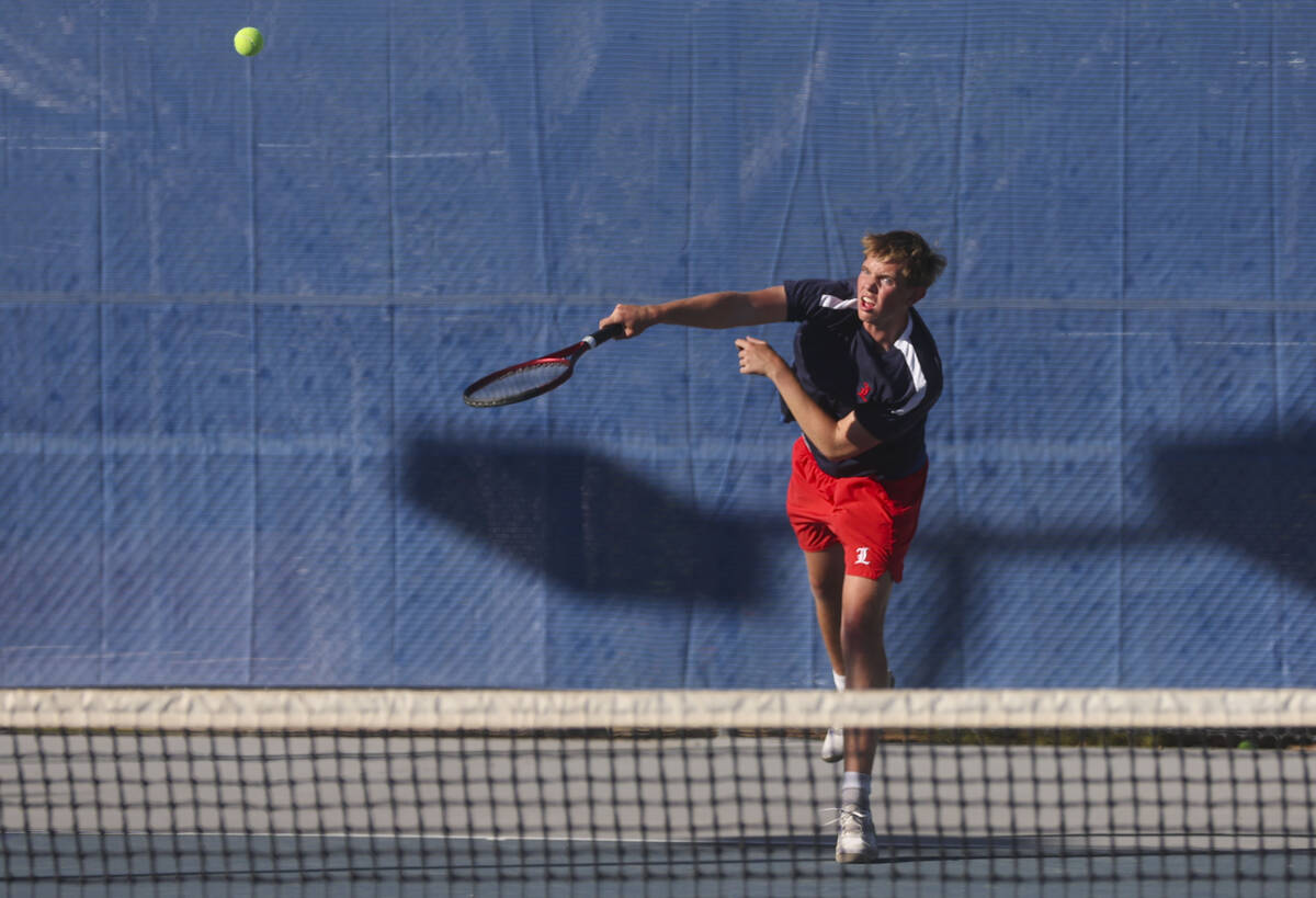 Liberty’s Preston Smith plays against The Meadows during the 4A tennis team Southern Reg ...