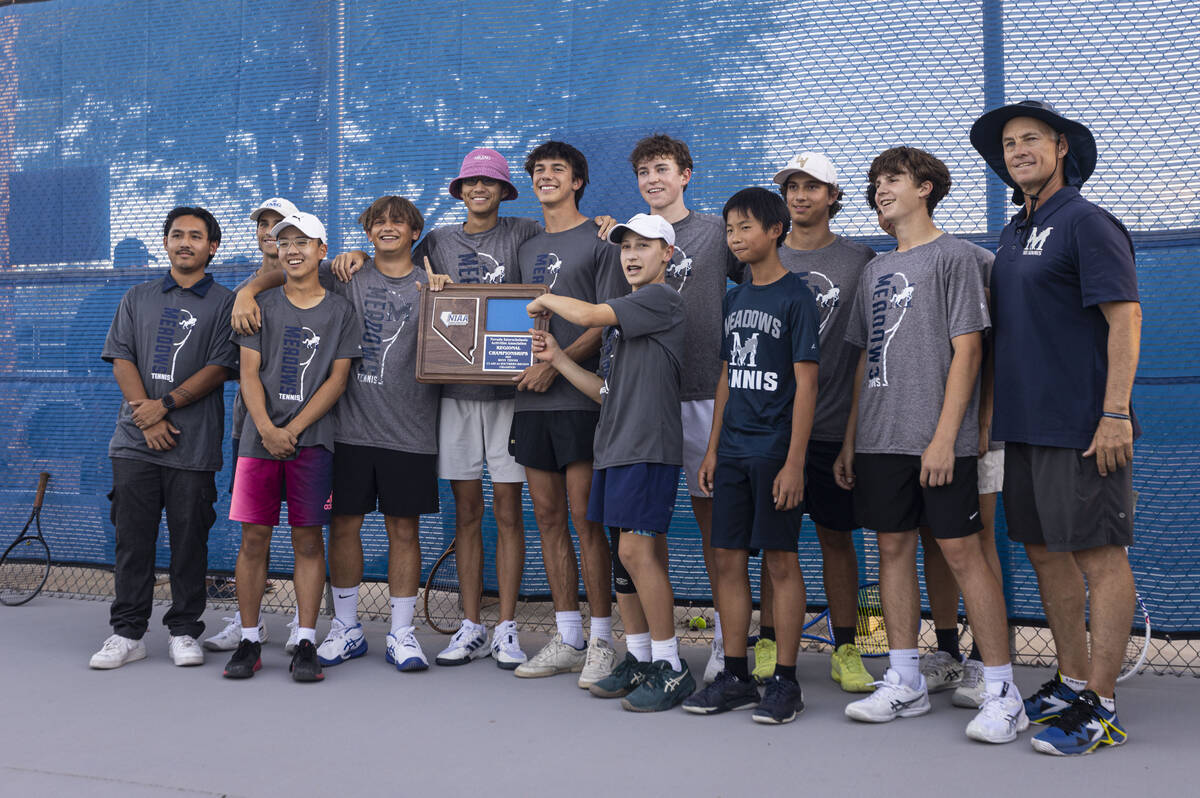 The Meadows boys tennis team pose with their trophy after winning in the 4A tennis team Souther ...