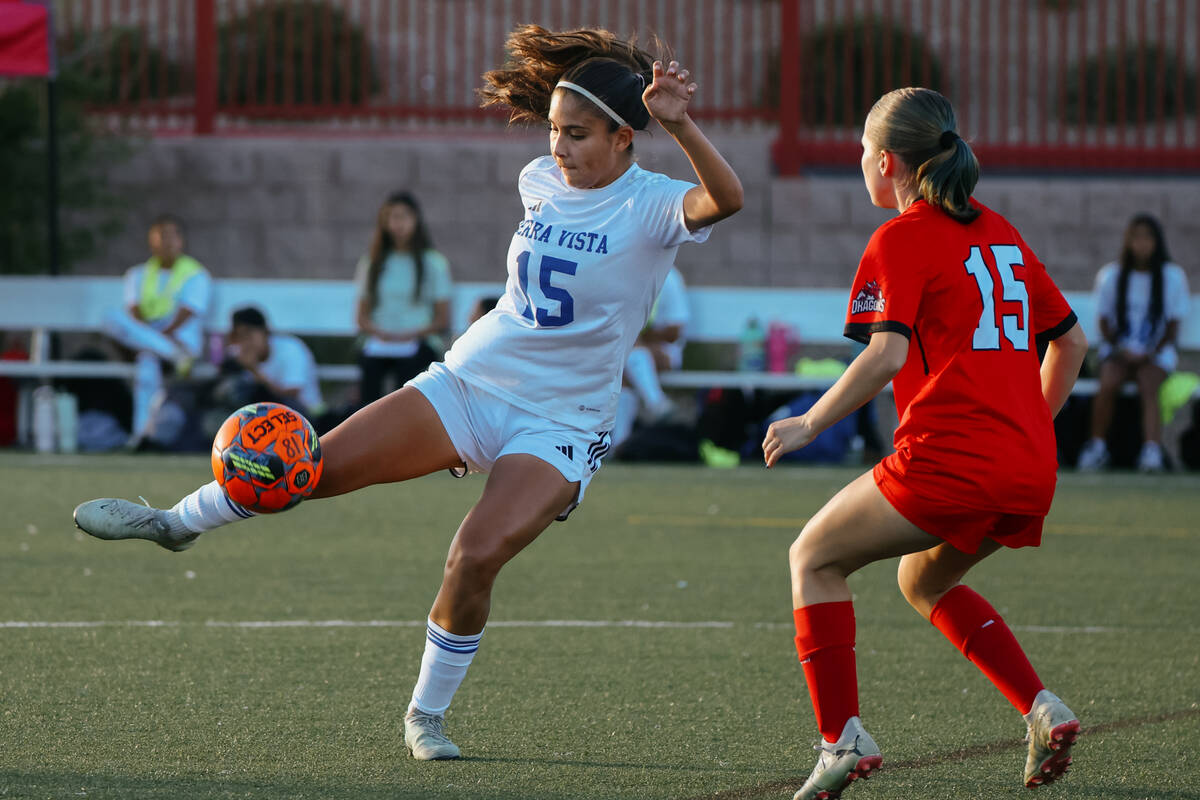 Sierra Vista midfielder Sophia Aragon (15) kicks the ball to keep control of it with pressure f ...