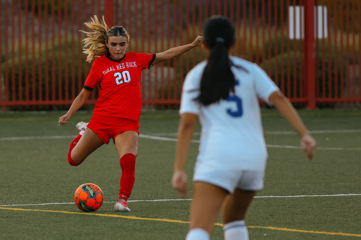 Doral Academy defender Gianna Davis (20) kicks the ball upfield during a soccer game on Tuesday ...