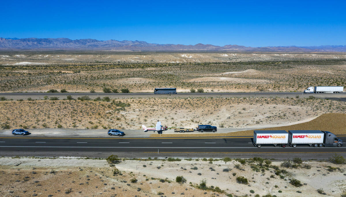 A plane piloted by Tzuriel Urbano rests on the shoulder of Interstate 15 north of Las Vegas aft ...