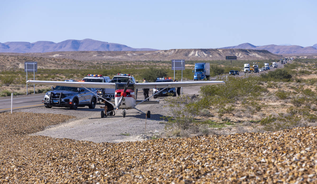 A plane piloted by Tzuriel Urbano rests on the shoulder of Interstate 15 north of Las Vegas aft ...