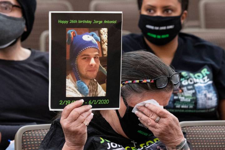 Carol Luke, holding a photograph of Jorge Gomez, a Black Lives Matter protester who was fatally ...
