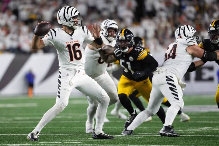 Cincinnati Bengals quarterback Joe Flacco (16) throws under press during an NFL football game a ...