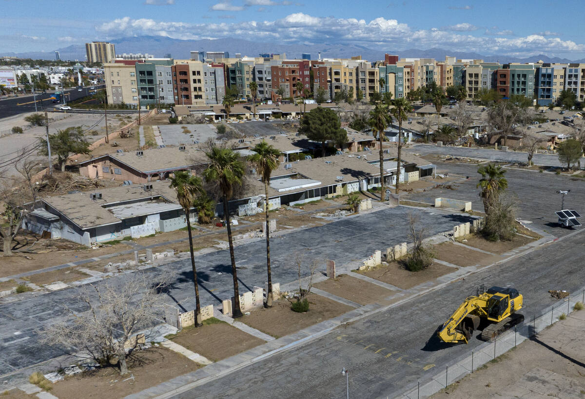 The rundown former Paradise Spa condo complex, in the foreground, is set to be redeveloped into ...