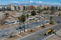 The rundown former Paradise Spa condo complex, in the foreground, is set to be redeveloped into ...