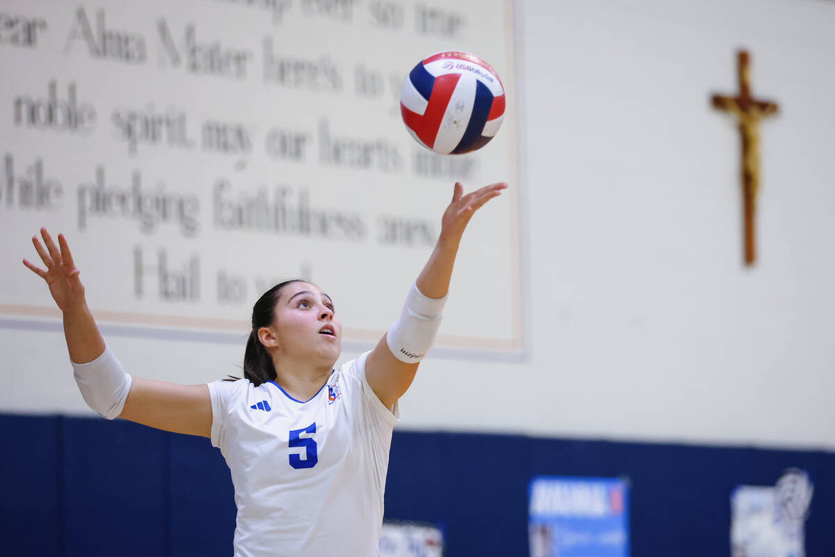 Bishop Gorman’s Sienna Gostanian (5) serves against Foothill during a volleyball game on ...