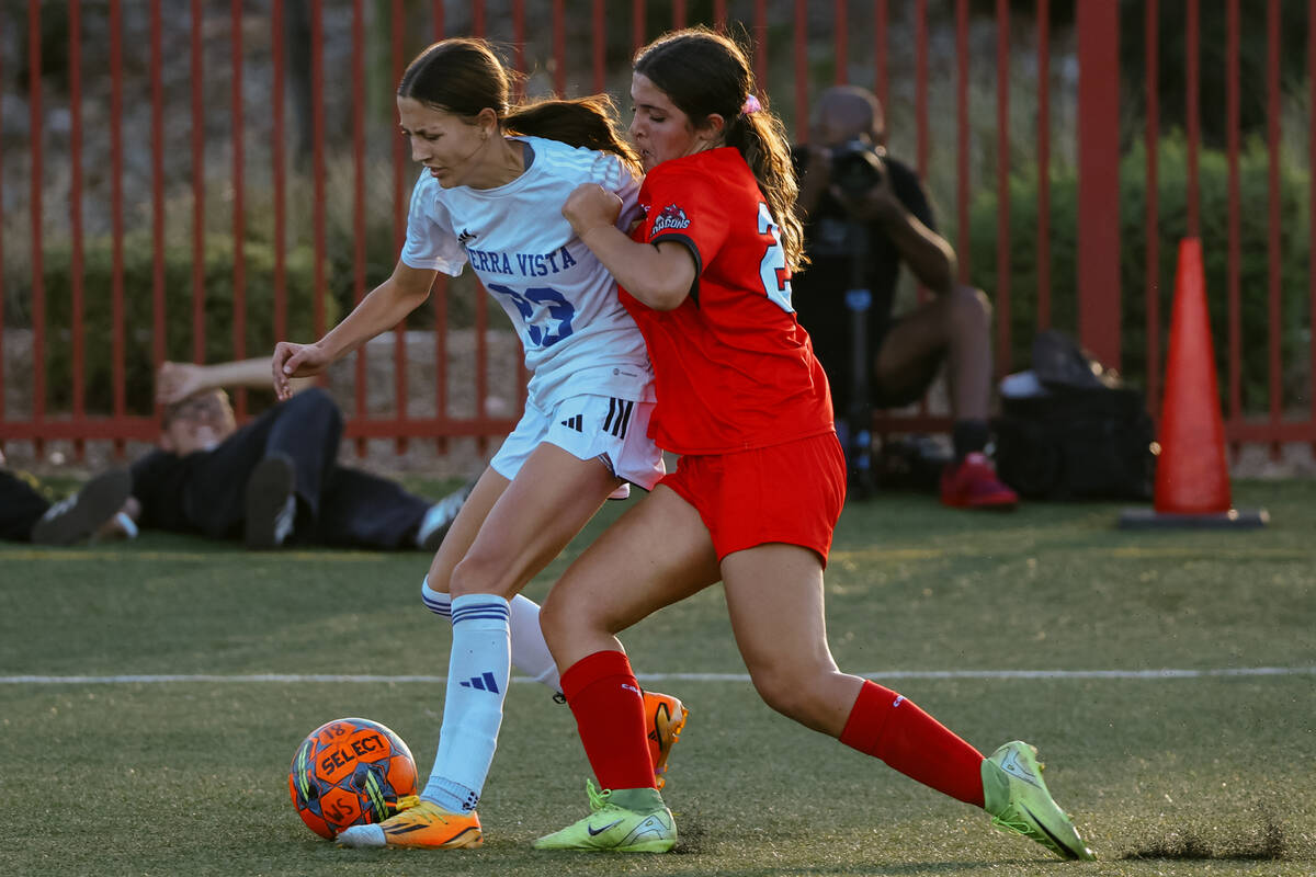 Doral Academy forward Sienna Turco (29) tackles Sierra Vista defender Hunter Hughes (23) during ...
