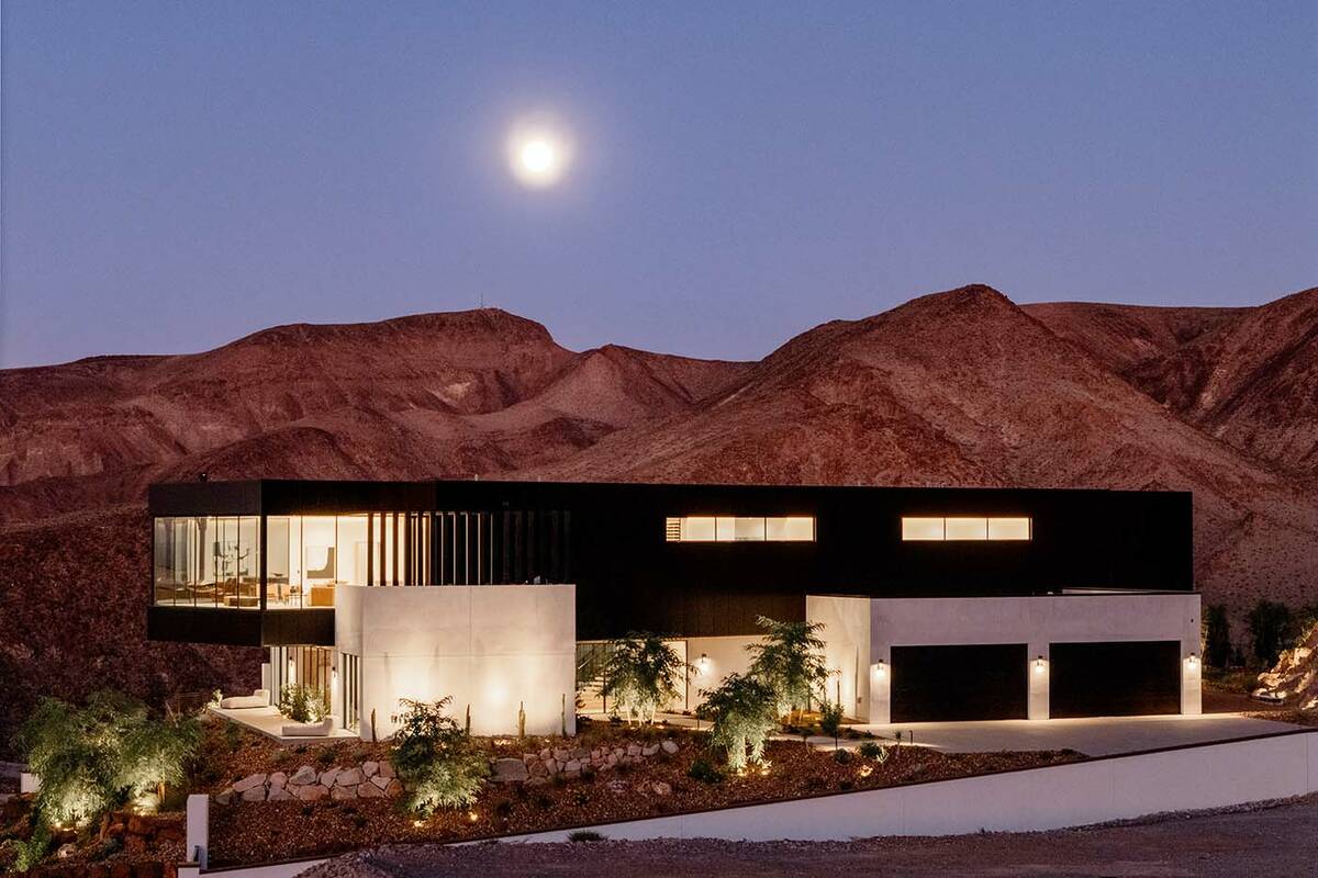 Set on a private corner homesite, the residence at 11 Chisel Crest Court commands 270-degree vi ...