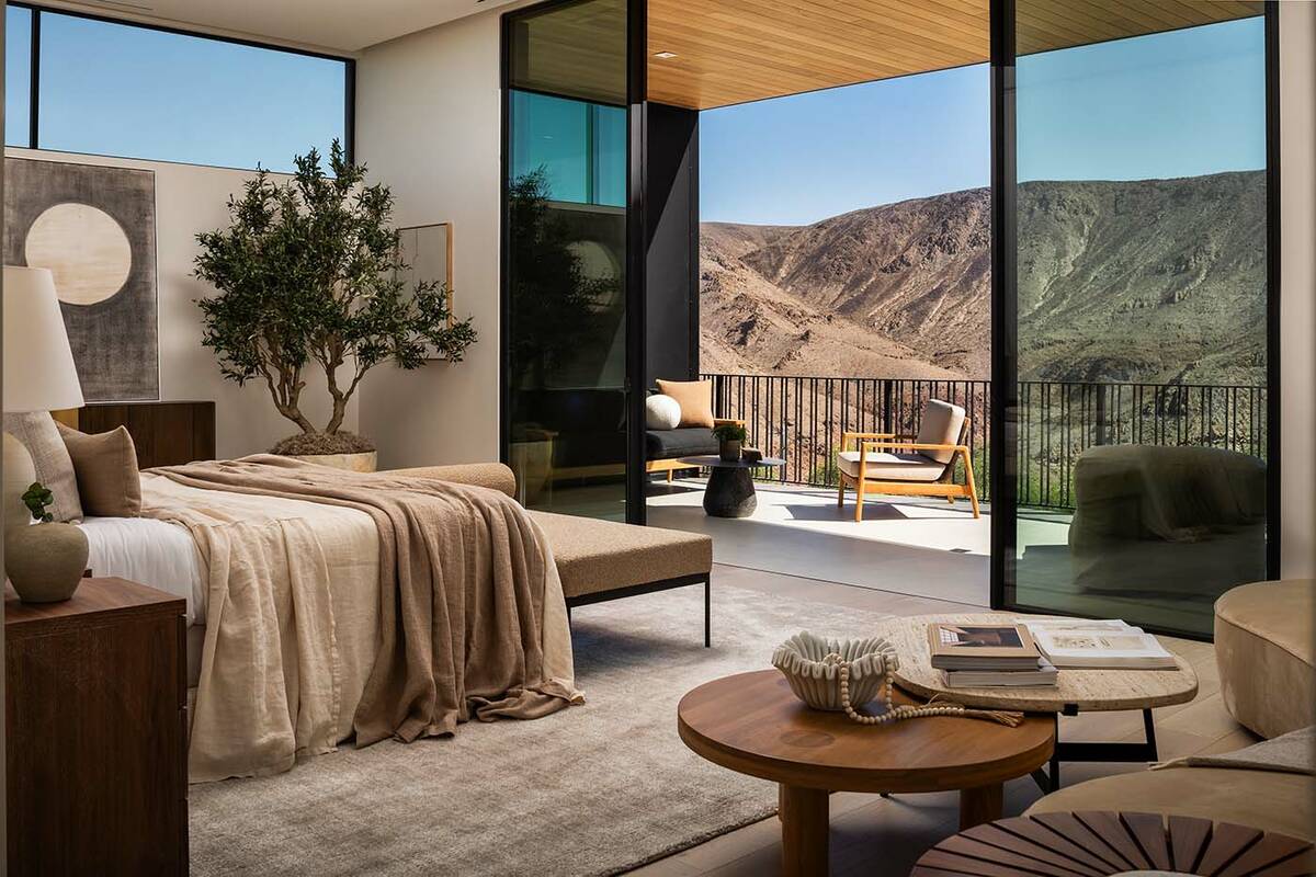 The primary living spaces at Chisel Crest Court occupy the upper level to capture panoramic vis ...
