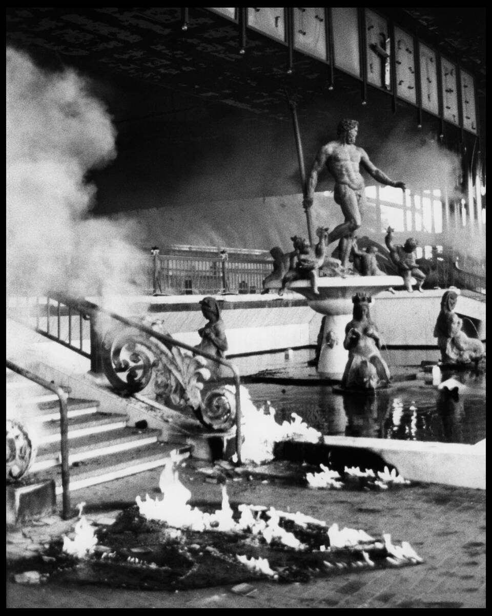 Smoke billows and flames continue to burn during the November 21,1980, MGM Grand Hotel in this ...