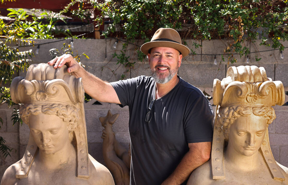 Collector Jeff Young poses for a photo with sculptures he believes survived the infamous MGM Gr ...