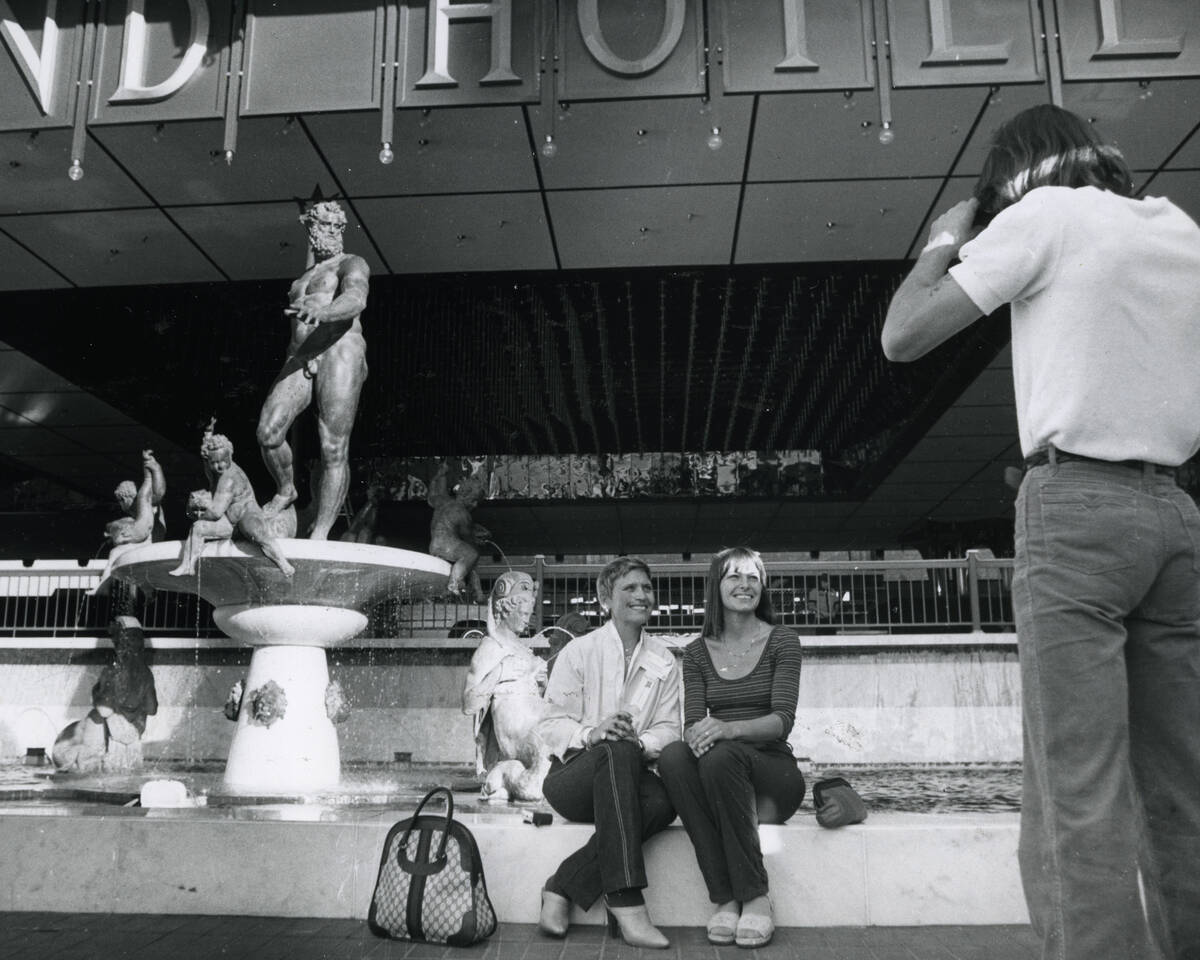 Gary Yarusi takes a photo of Theresa Sargento, left, and Susan Yarusi in front of the MGM Grand ...