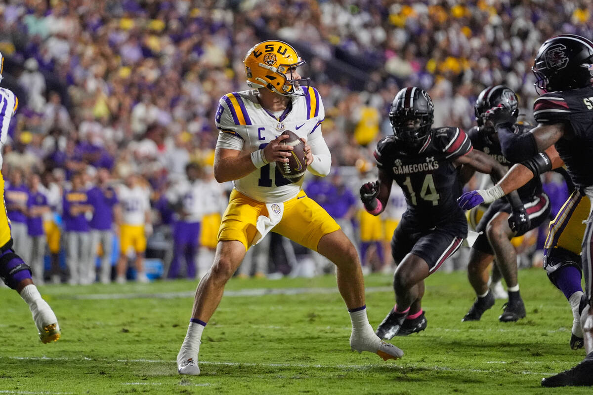 LSU quarterback Garrett Nussmeier (18) drops back to pass against South Carolina in the second ...