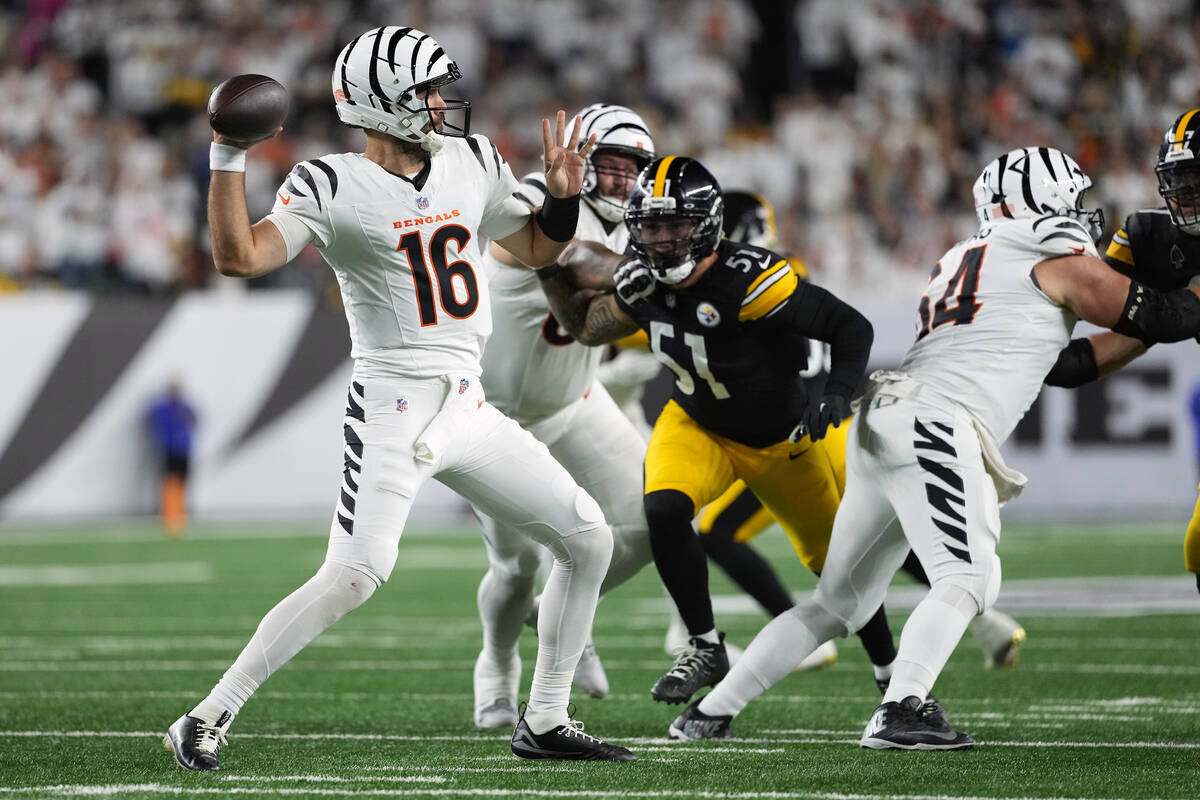 Cincinnati Bengals quarterback Joe Flacco (16) throws under press during an NFL football game a ...