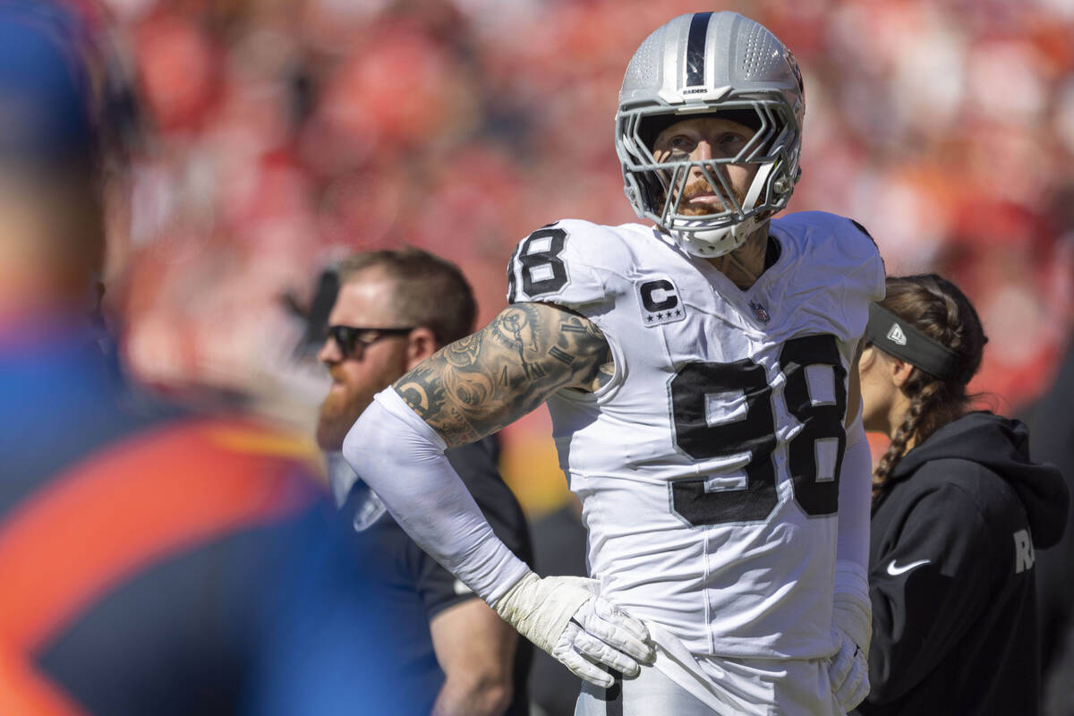 Raiders defensive end Maxx Crosby (98) watches the team play the Kansas City Chiefs from the si ...