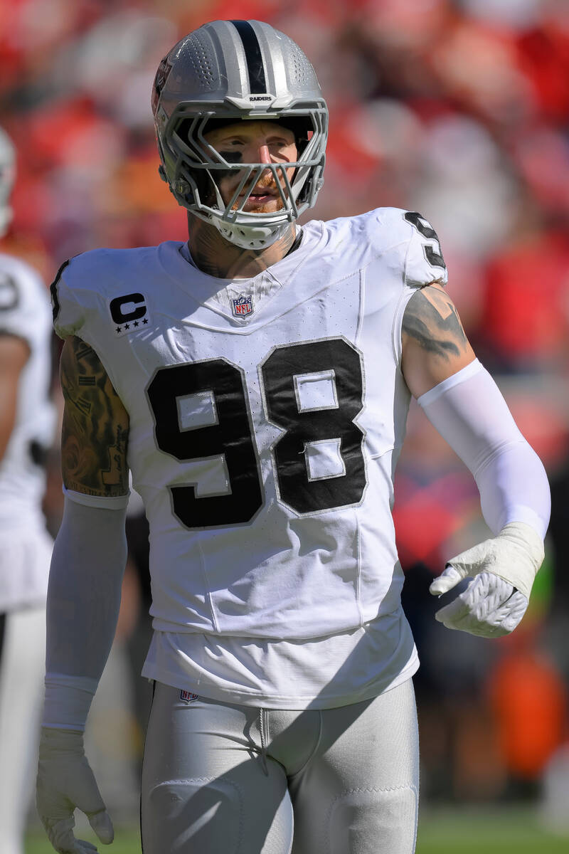 Las Vegas Raiders defensive end Maxx Crosby comes onto the field during the first half of an NF ...