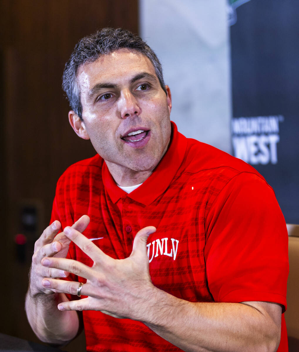 UNLV head coach Josh Pastner answers questions during the Mountain West basketball media day at ...