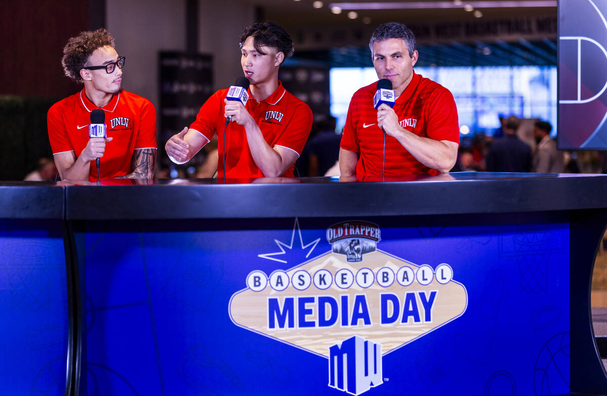 UNLV player Myles Che, center, answers a question joined by and teammate Dravyn Gibbs-Lawhorn, ...