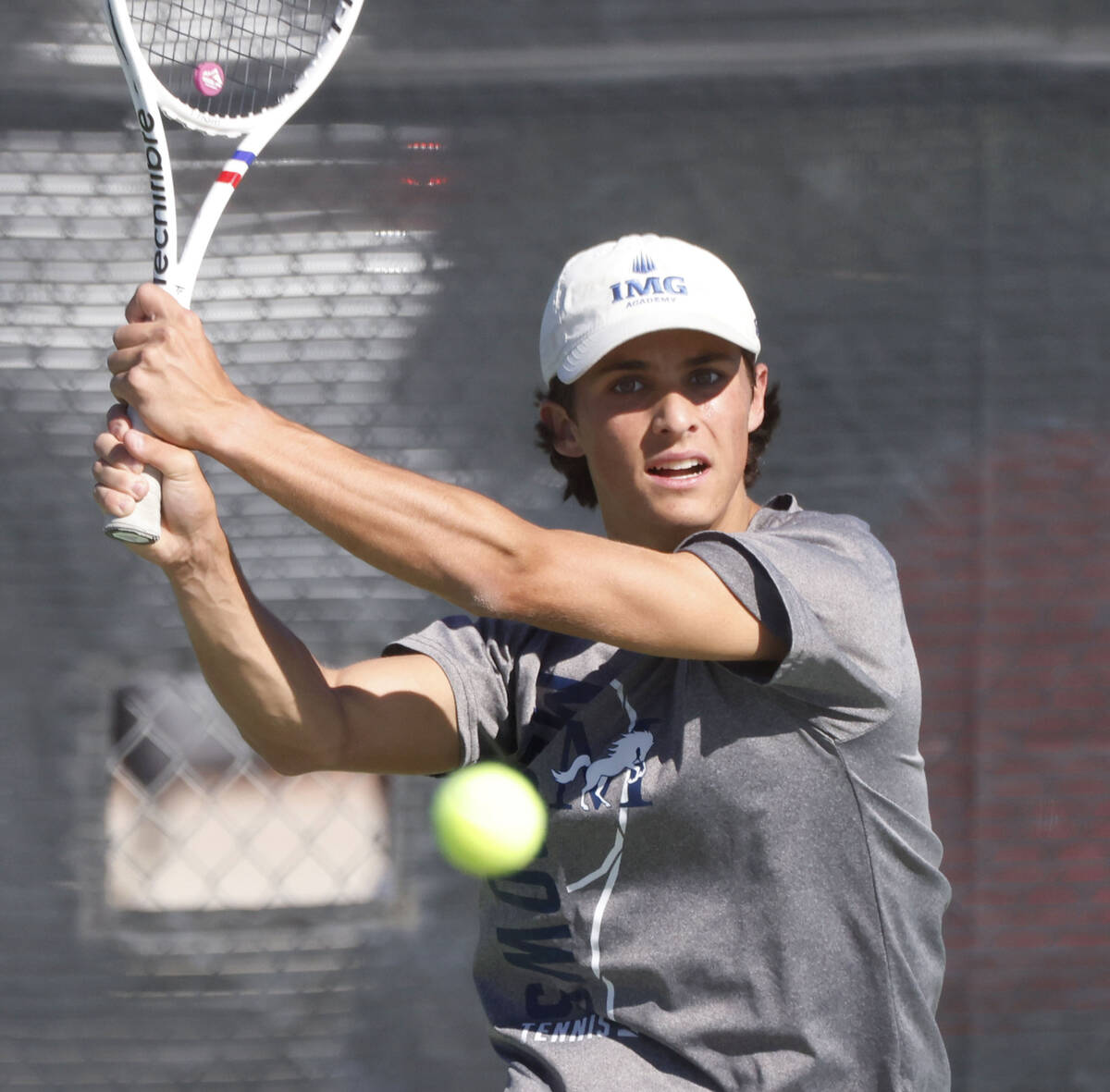 The Meadows' Jacob Garber returns the ball against Liberty during the 4A tennis team State ...