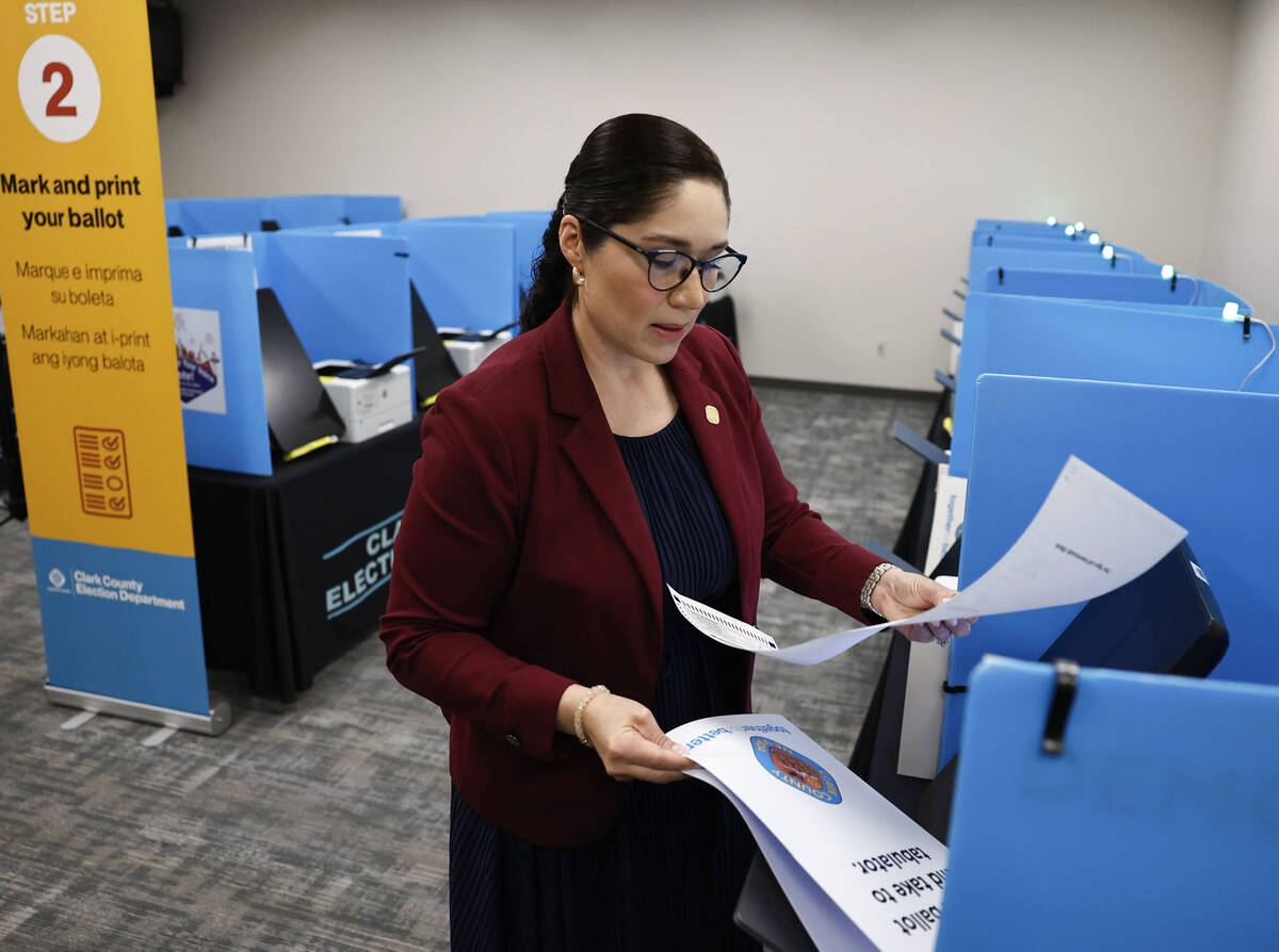 Lorena Portillo, Clark County Registrar of Voters, demonstrates step two, marking and printing ...