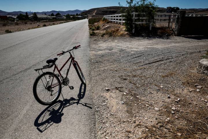 A bike is parked outside a home close to South Monte Cristo Way and West Meranto Avenue on Frid ...
