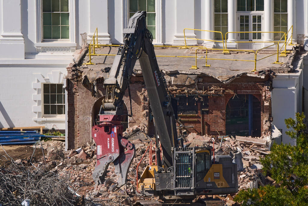 Work continues on a largely demolished part of the East Wing of the White House, Thursday, Oct. ...