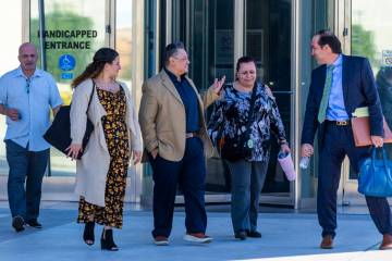 (LtoR) Jorge Gomez, Jazmin Gomez, Rene, and Jeanne Llera talk with their attorney Eric Valenzue ...