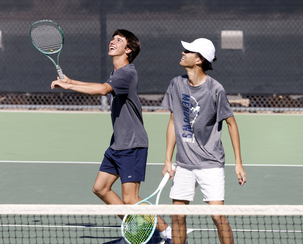 The Meadows Matt Maddox, left, and his tennis partner Steven Tian keep their eyes on the ball d ...