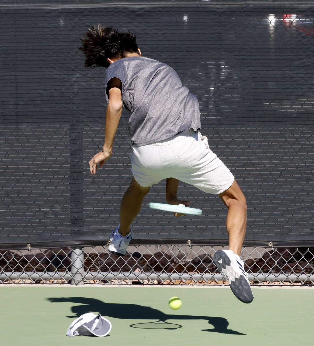The Meadows Steven Tian attempts to return the ball between his legs during the Class 4A boys t ...