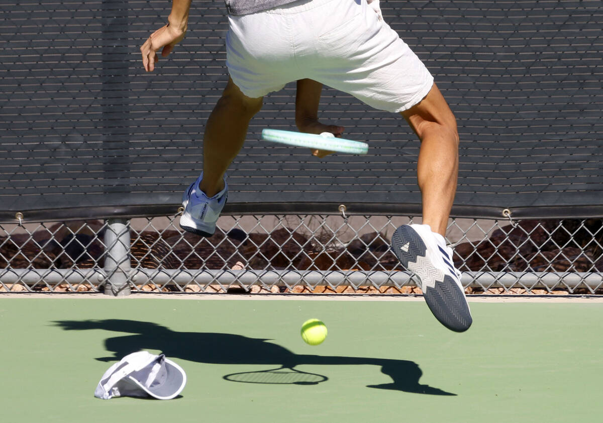 The Meadows Steven Tian attempts to return the ball between his legs during the Class 4A boys t ...